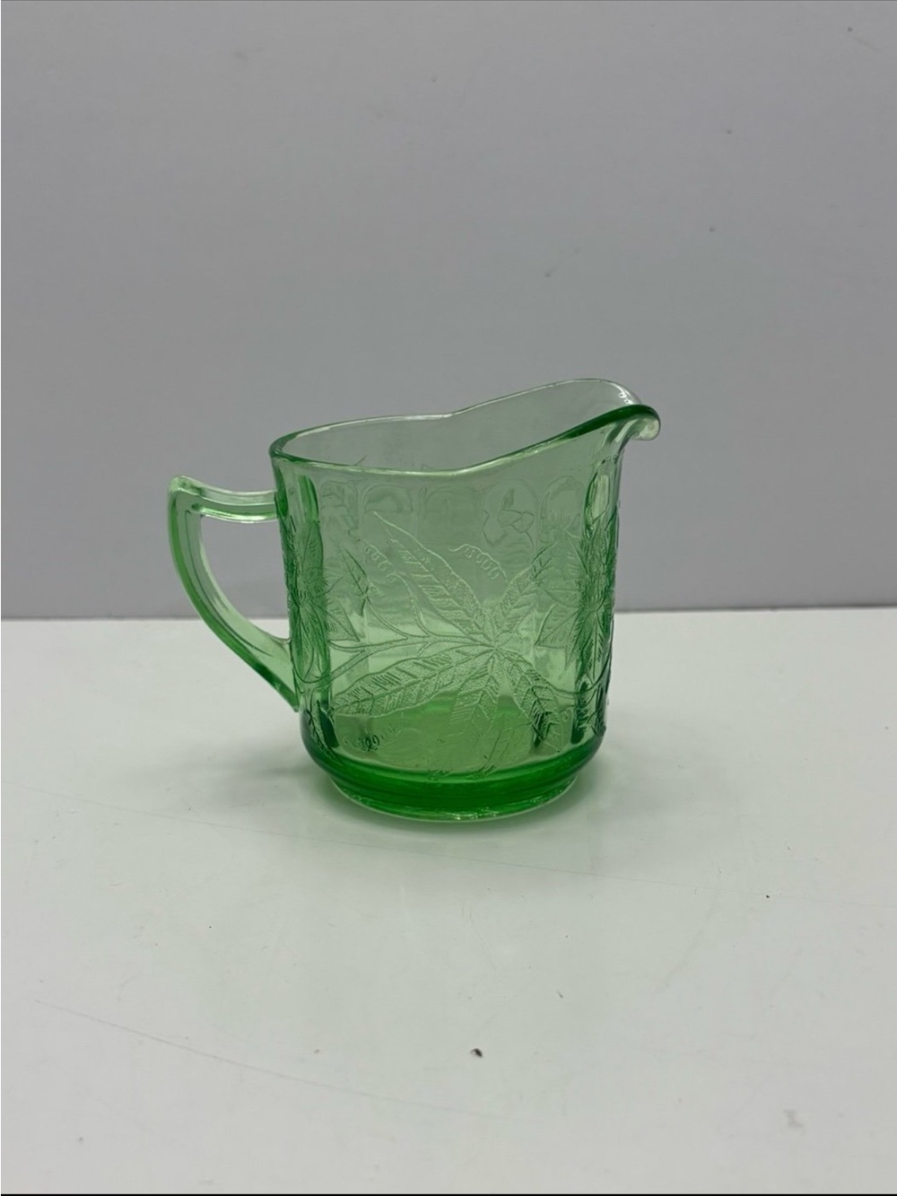 Vintage uranium Green Jeannette Glass Floral
Poinsettia Depression Creamer